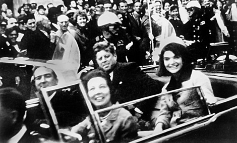 Although blurry this photograph shows President John F Kennedy and Mrs - photo 1