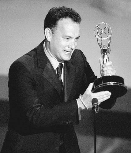 Tom Hanks accepts an Emmy Award as part of a team of directors of the - photo 1