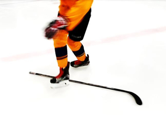 Skill training of inner and outer edges around and over the hockey stick at a - photo 3