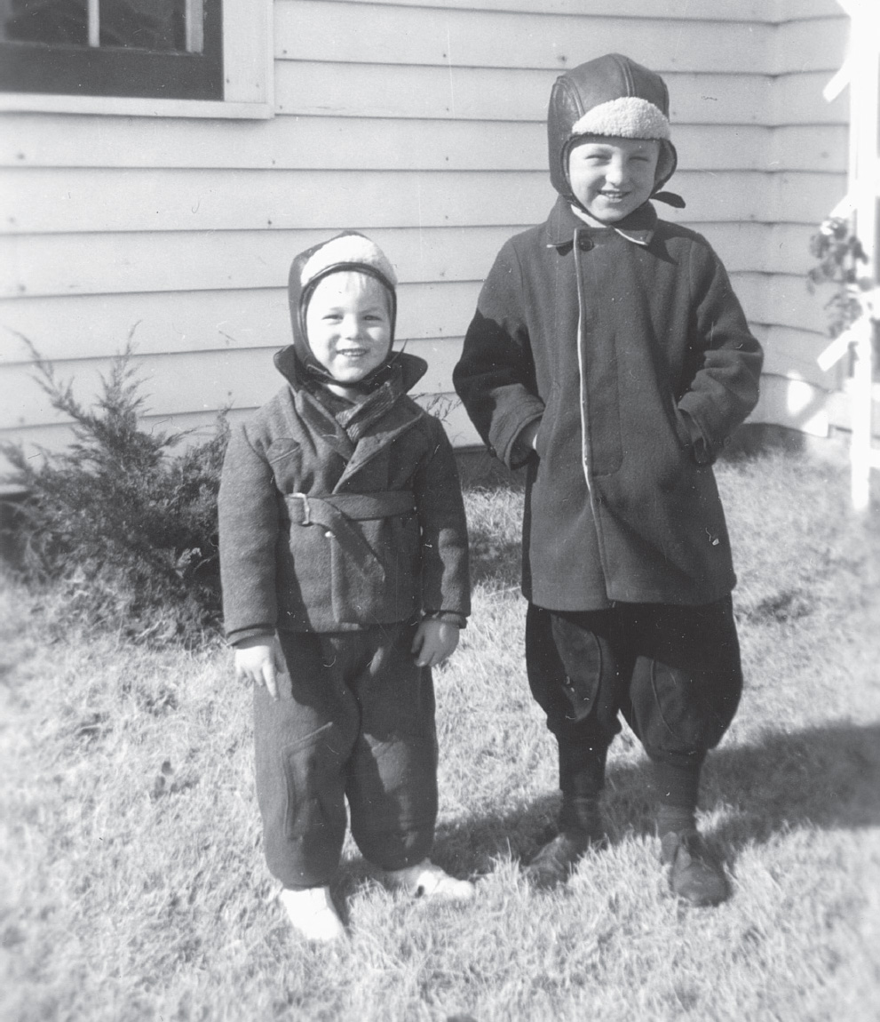 With big brother Del at home on Jennings Street Dad was a chemist who worked - photo 4