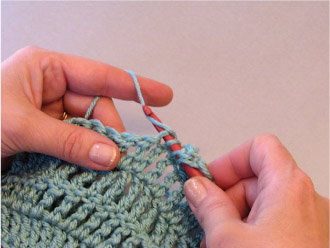 You will now have 4 loops on the hook Yarn over and pull through 2 loops - photo 22