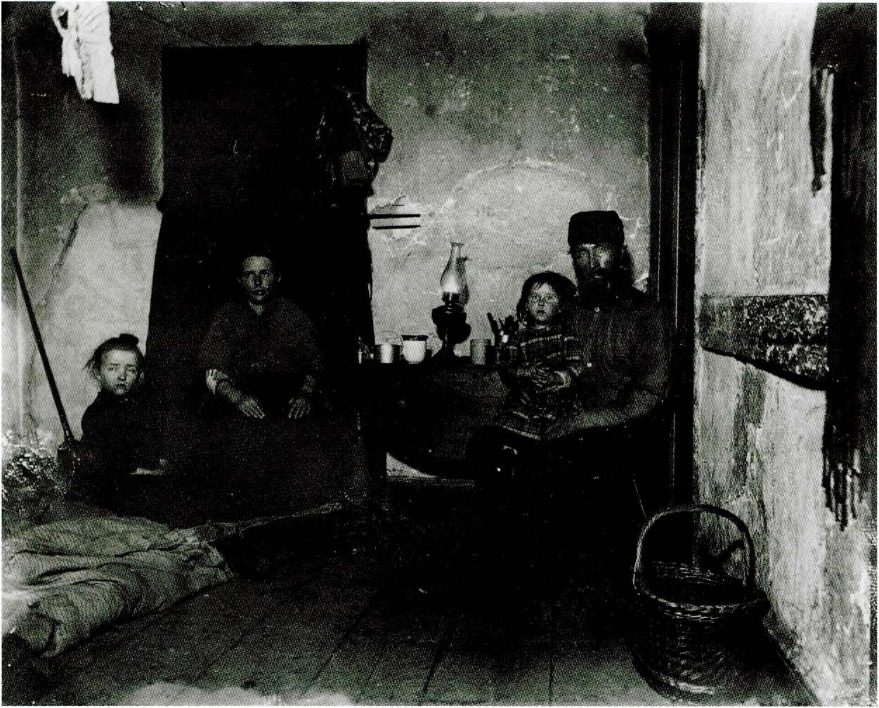 Around 1889 this family struggled to survive in the two small dark rooms of - photo 5