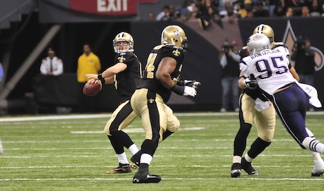 Brees drops back to pass during the third quarter of a game against the New - photo 2