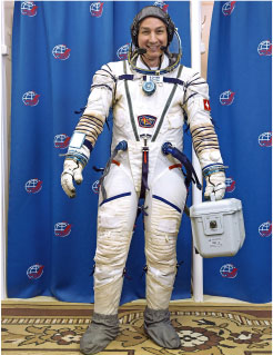 Wearing the Sokol spacesuit in the cosmonaut changing room Copyright - photo 5