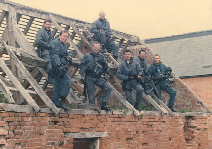 Black team poses for a group photograph during counter-terrorist training - photo 3