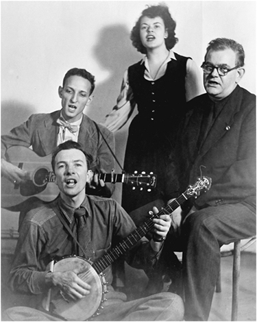 Pete Seeger seated Fred Hellerman Ronnie and Lee Hays at the Village - photo 7