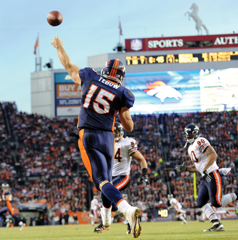 Image Credit AP ImagesThe Denver PostJohn Leyba Tebow launches a pass in a - photo 3