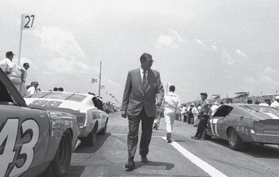 Bill France Sr NASCARs founder and first president walks down the Daytona - photo 10