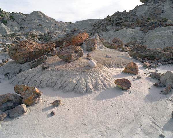 Sandstone lag litters shaly badlands dawn the Haystacks Sweetwater County - photo 10