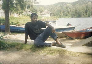 Vianney enjoying a day by Lake Kivu Sitting behind our house looking out - photo 5