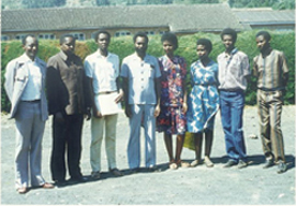 At Damascenes high school graduation Dad is second from left Damascene is - photo 11