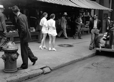 Women in shorts being stared at by men outside Stainton and Evis Furniture - photo 4