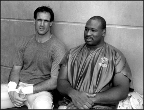 Mike Tice shown here with a very young Cortez Kennedy walked into a punishing - photo 4