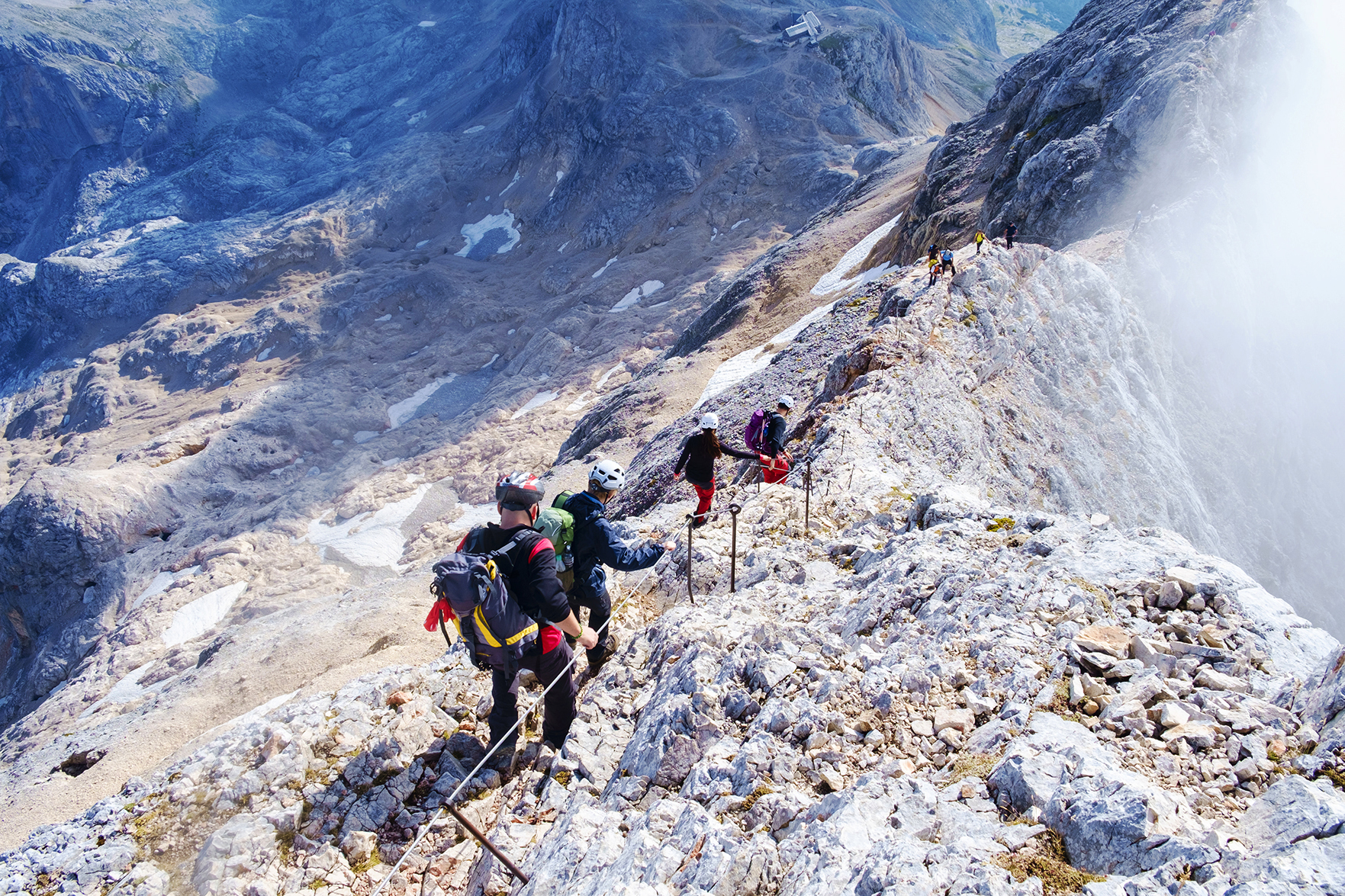 Climbers on DEJANKSHUTTERSTOCK Crossing the Vri Pass Make your way by - photo 13