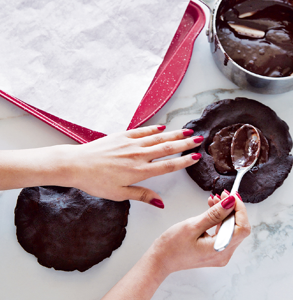 Use the palms of your hands to flatten the cookie dough balls to round circles - photo 6