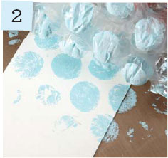 Turn the paint-covered bubble wrap over and place it on a sheet of cardstock - photo 11