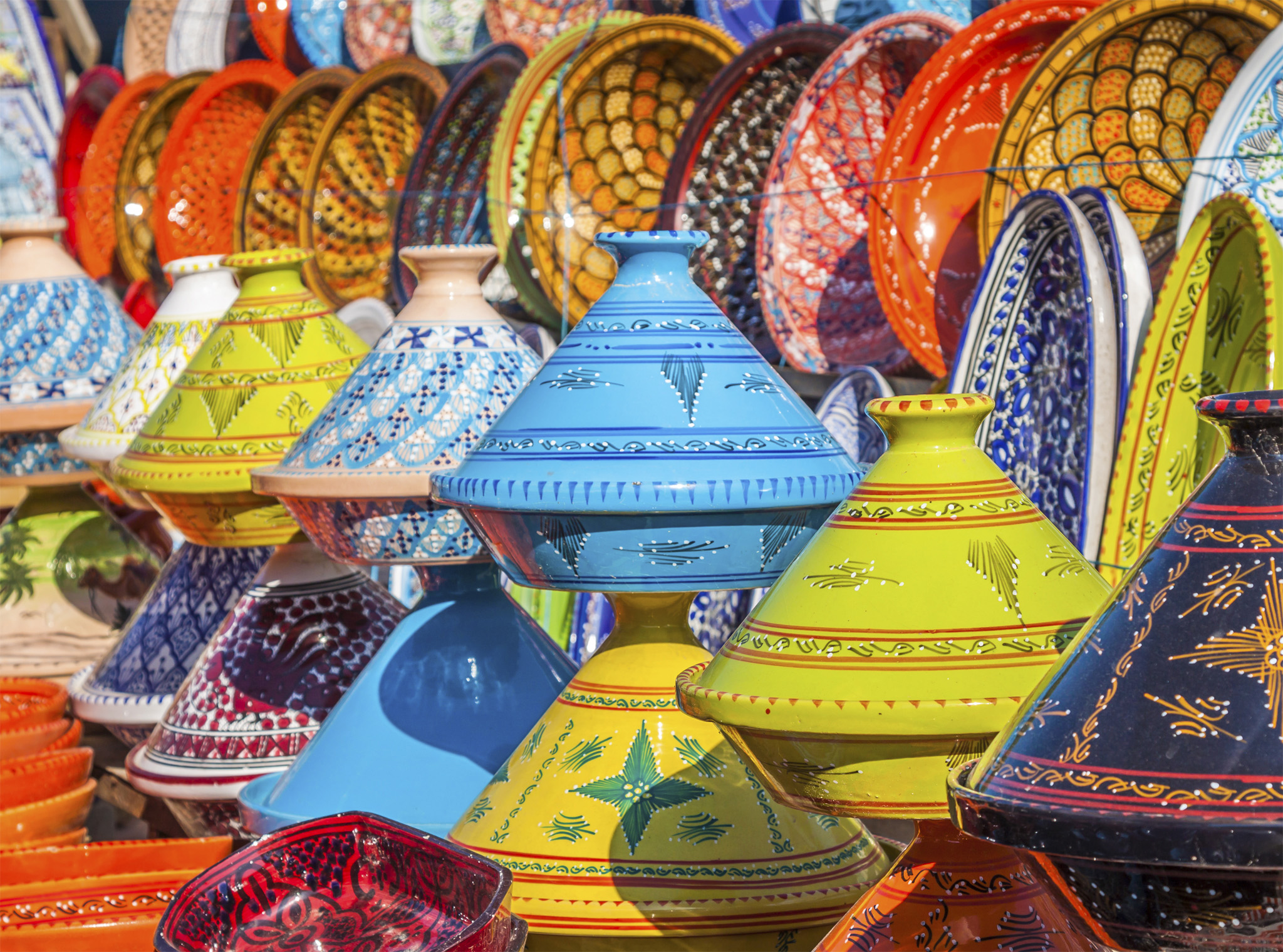 The souks are a warren of passageways filled with brightly coloured local wares - photo 4