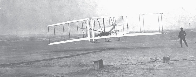 Kill Devil Hills near Dayton Ohio 17 December 1903 Orville Wright makes the - photo 8