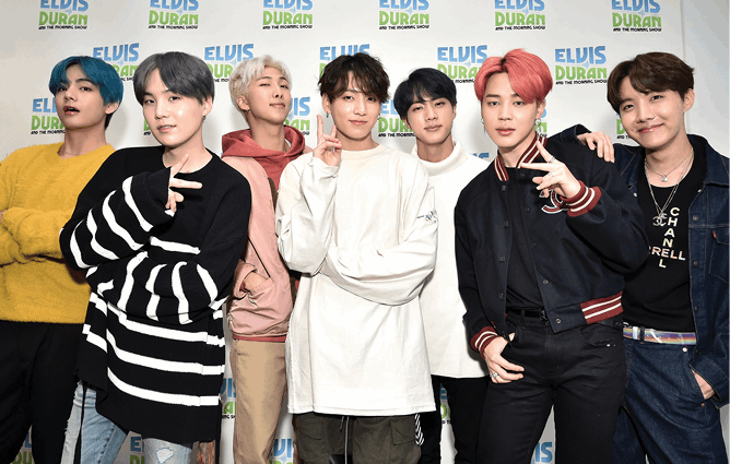 Looking dapper while stopping by for a chat with DJ Elvis Duran in 2019 BTS is - photo 4