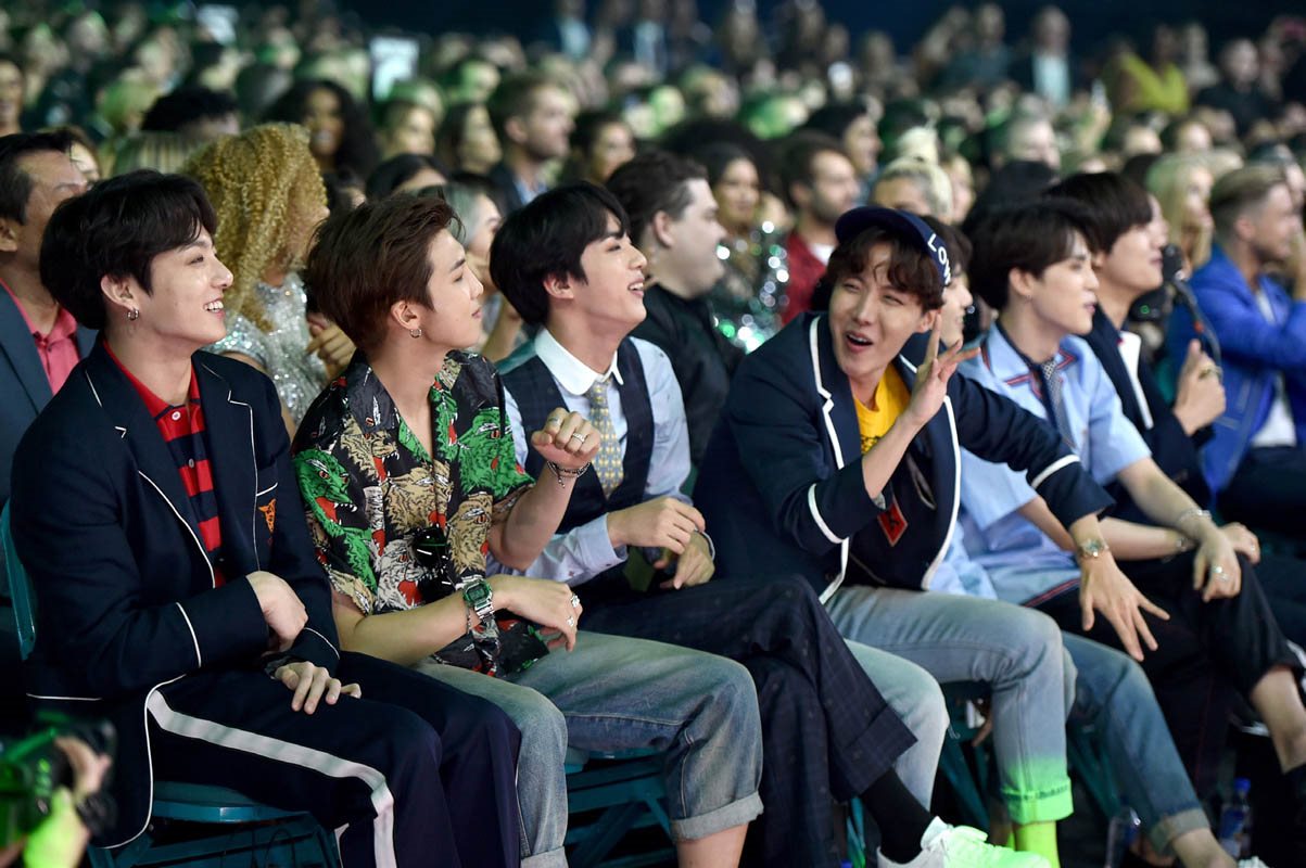 BTS enjoying the BBMAs on the front row alongside top music celebrities In a - photo 4