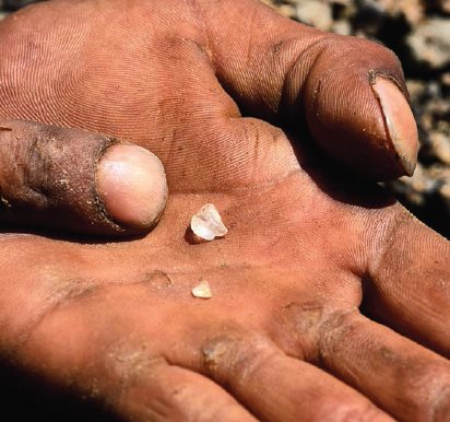 Rough diamonds on a miners hand in South Africa Myth 2 Diamonds Come from - photo 5