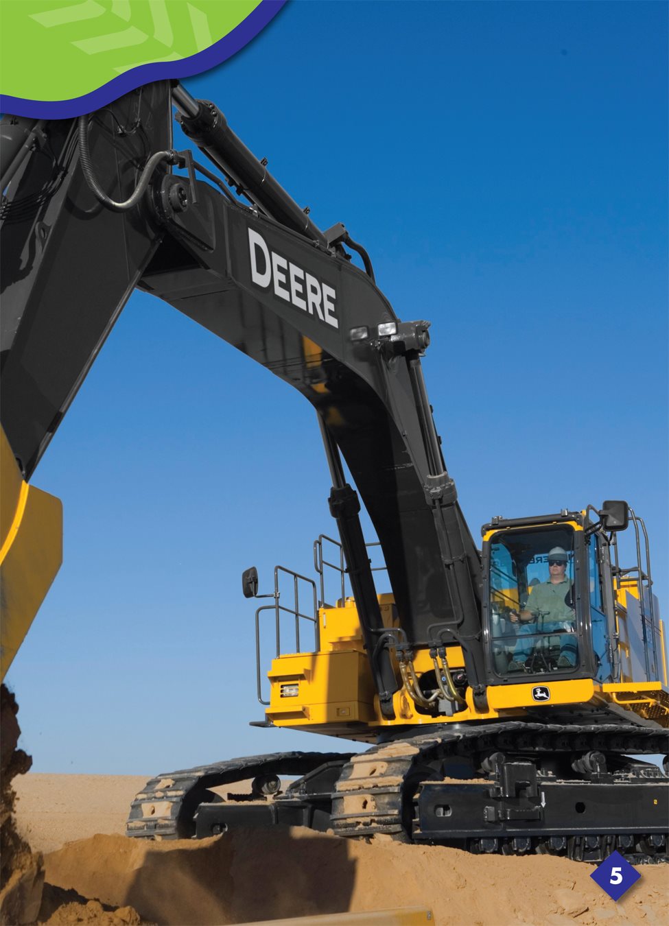 The backhoe has a cab the place where a worker sits A worker sits in the - photo 5