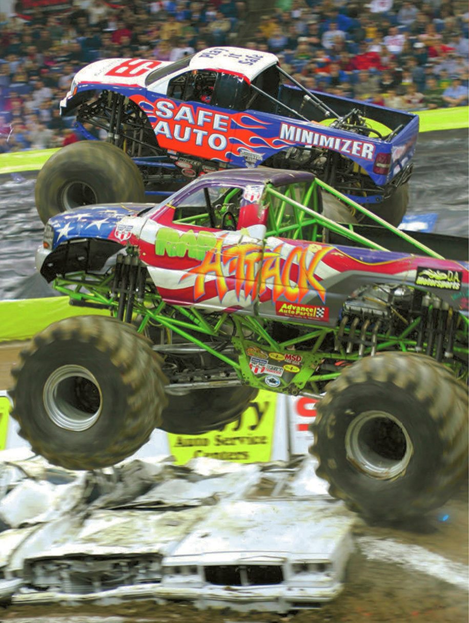 CHAPTER Two monster trucks line up to race Engines roar as the drivers - photo 5