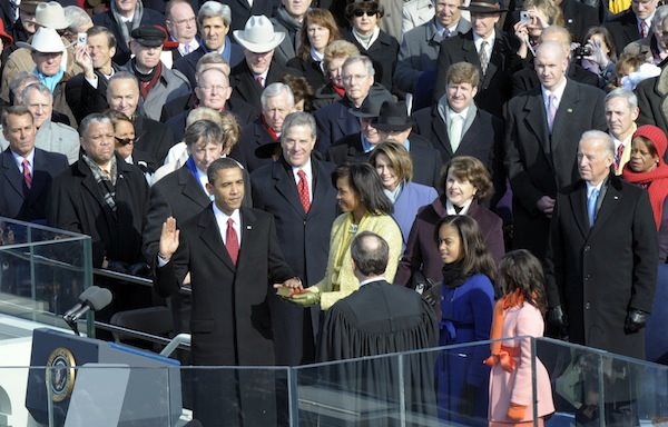 Barack Obama is sworn in as the 44th president by Chief Justice John G Roberts - photo 3