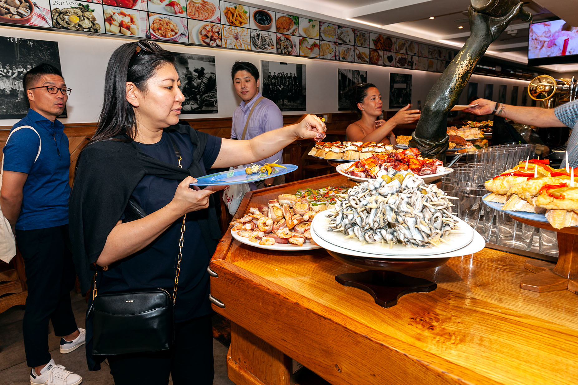 ALFERNECSHUTTERSTOCK Pintxos Enter any bar in the region and the counter is - photo 12