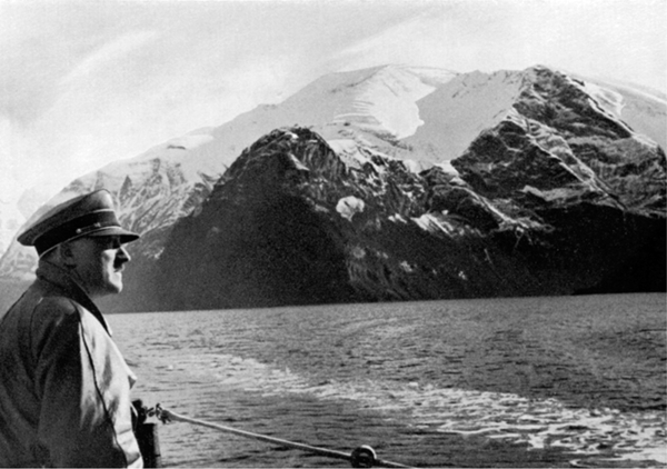 i1 Adolf Hitler observes the scenery on board the Deutschland in the - photo 2