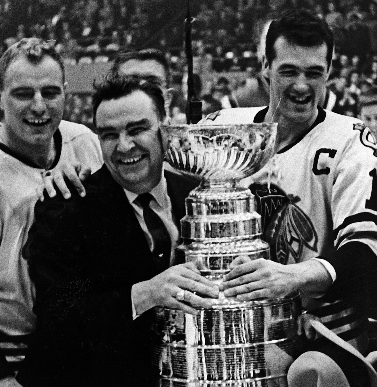 Members of the Chicago Blackhawks celebrate their Stanley Cup win after - photo 6