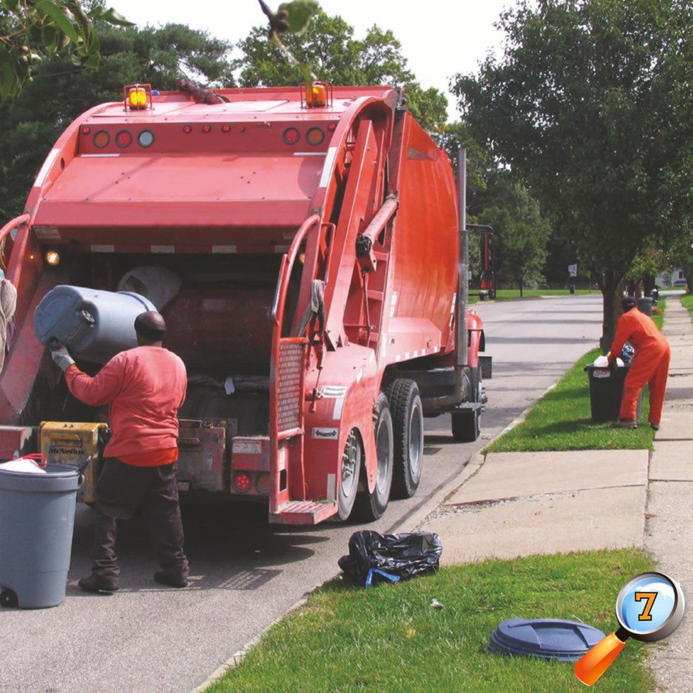 Garbage Trucks Sanitation workers put garbage into big trucks Many - photo 9
