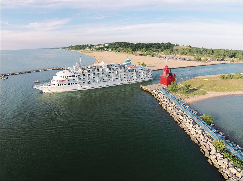 Seen leaving Holland Harbor is the Pearl Mist an excursion ship plying the - photo 2