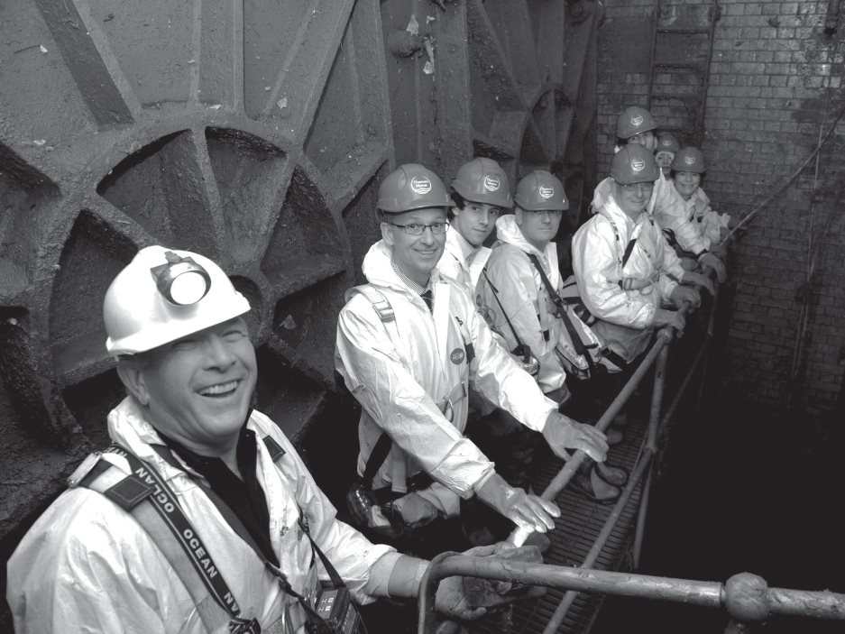 A visit with key stakeholders to the Fleet Main Sewer standing behind an - photo 6