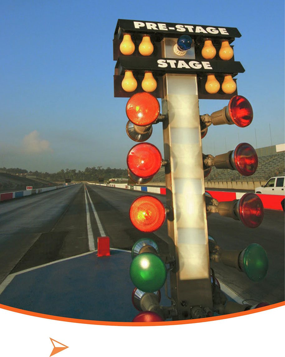 A tall set of lights tells drivers when to start The drivers apply the - photo 8