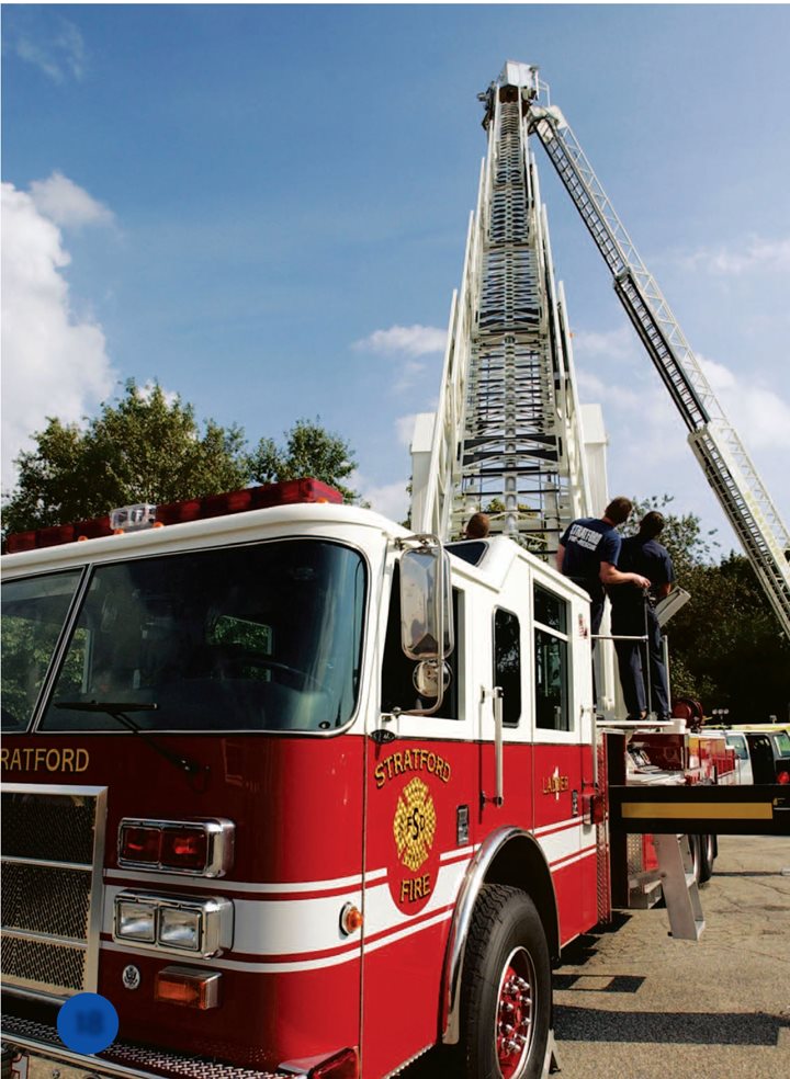 A tower truck has a ladder on top The ladder is heavy It could tip the - photo 19