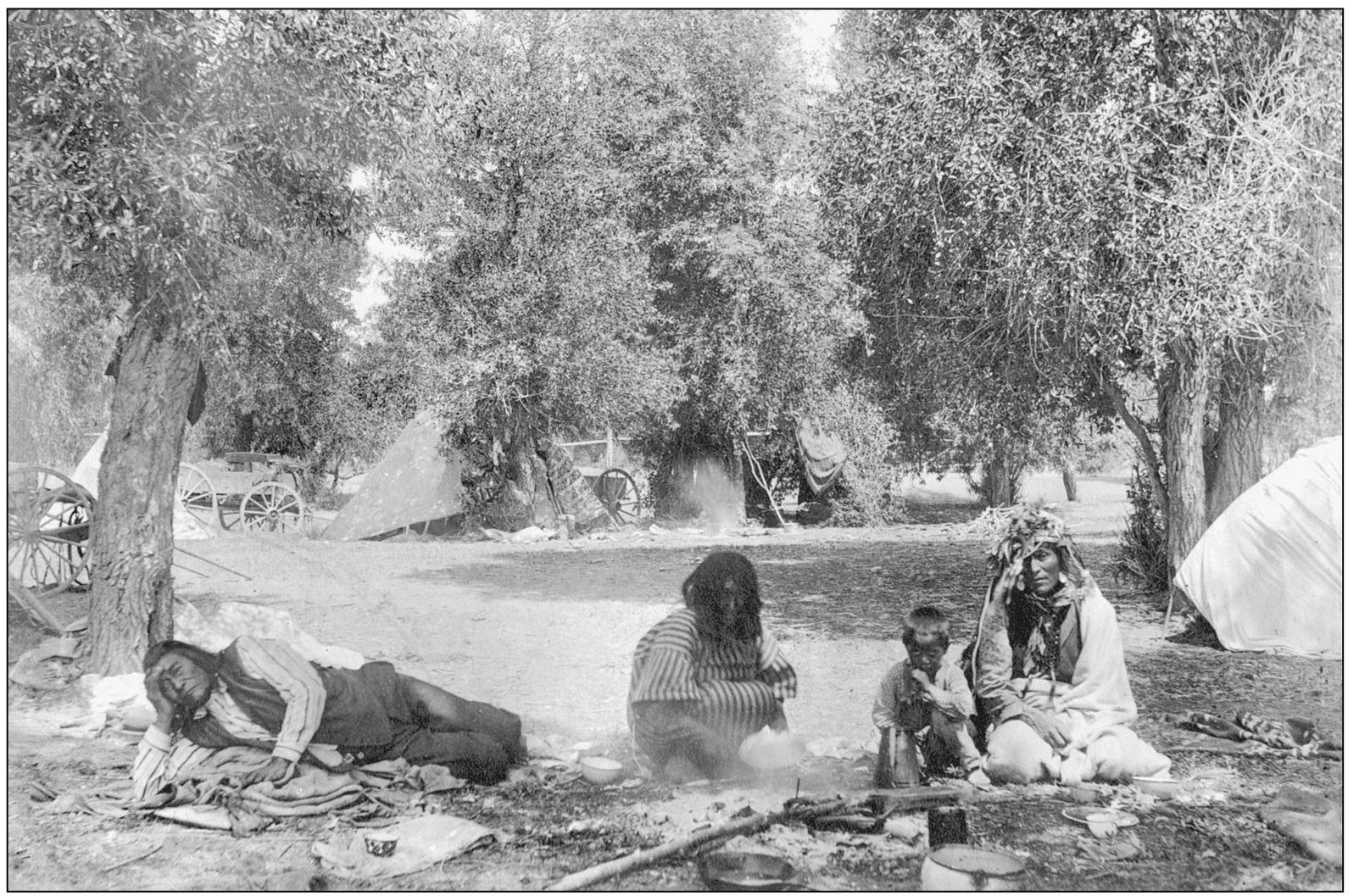 Chief Tendoy and his family are camped at a favorite camp site just north of - photo 9