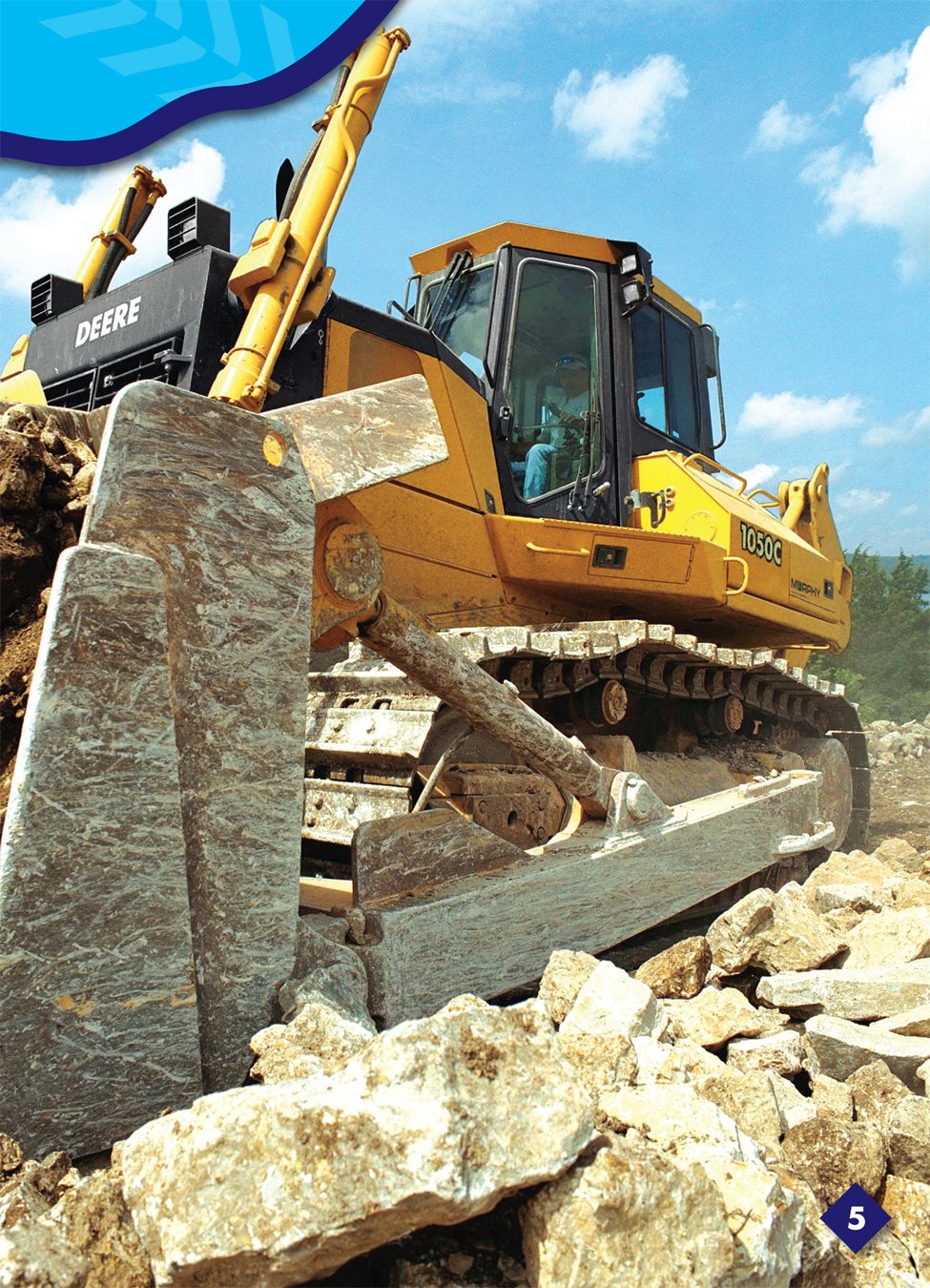 The bulldozer has a cab the place where a worker sits A worker sits in - photo 4