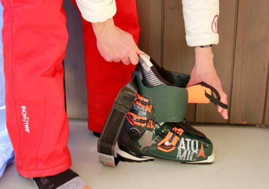 Figure 1 Pulling the tongue of the boot forward P ull the tongue of the boot - photo 5