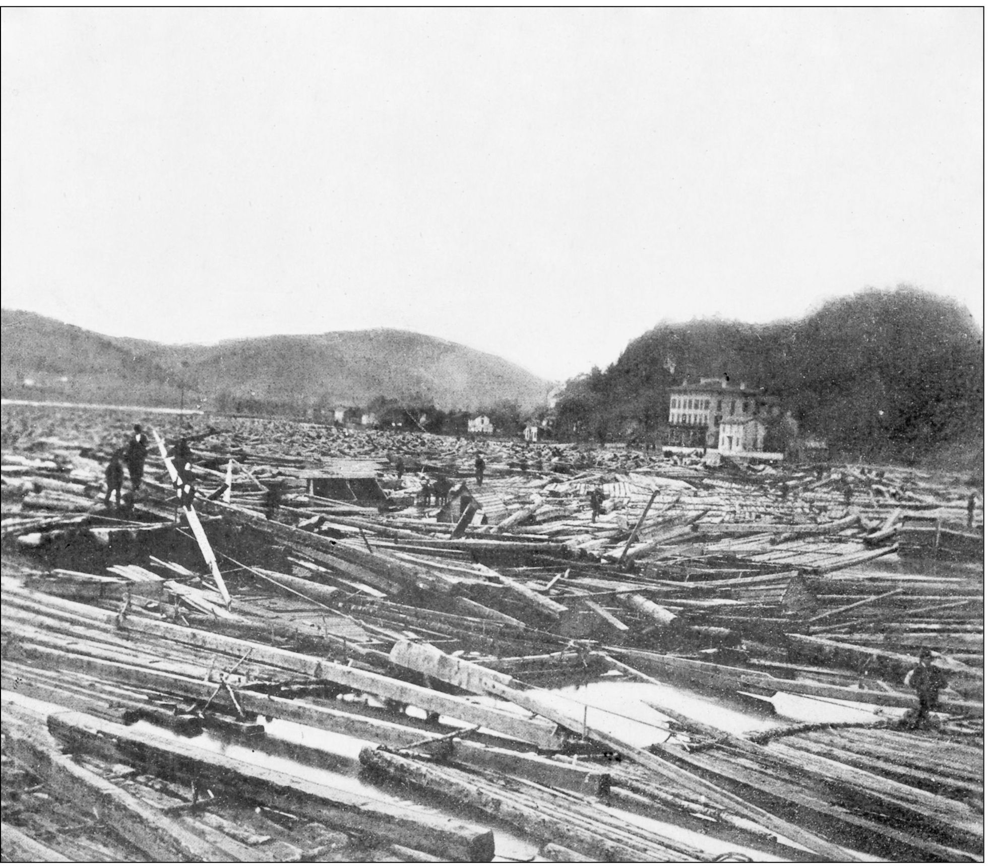 At the height of the lumber season hundreds of rafts floated down the river at - photo 11