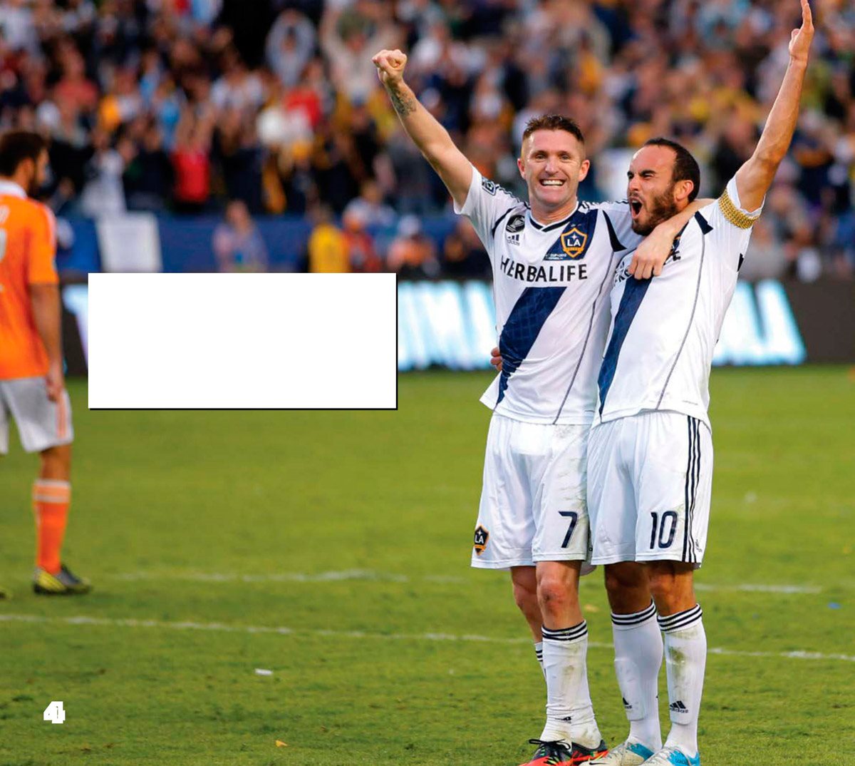 Robbie Keane and Landon Donovantwo of the worlds top playerscelebrate after - photo 6