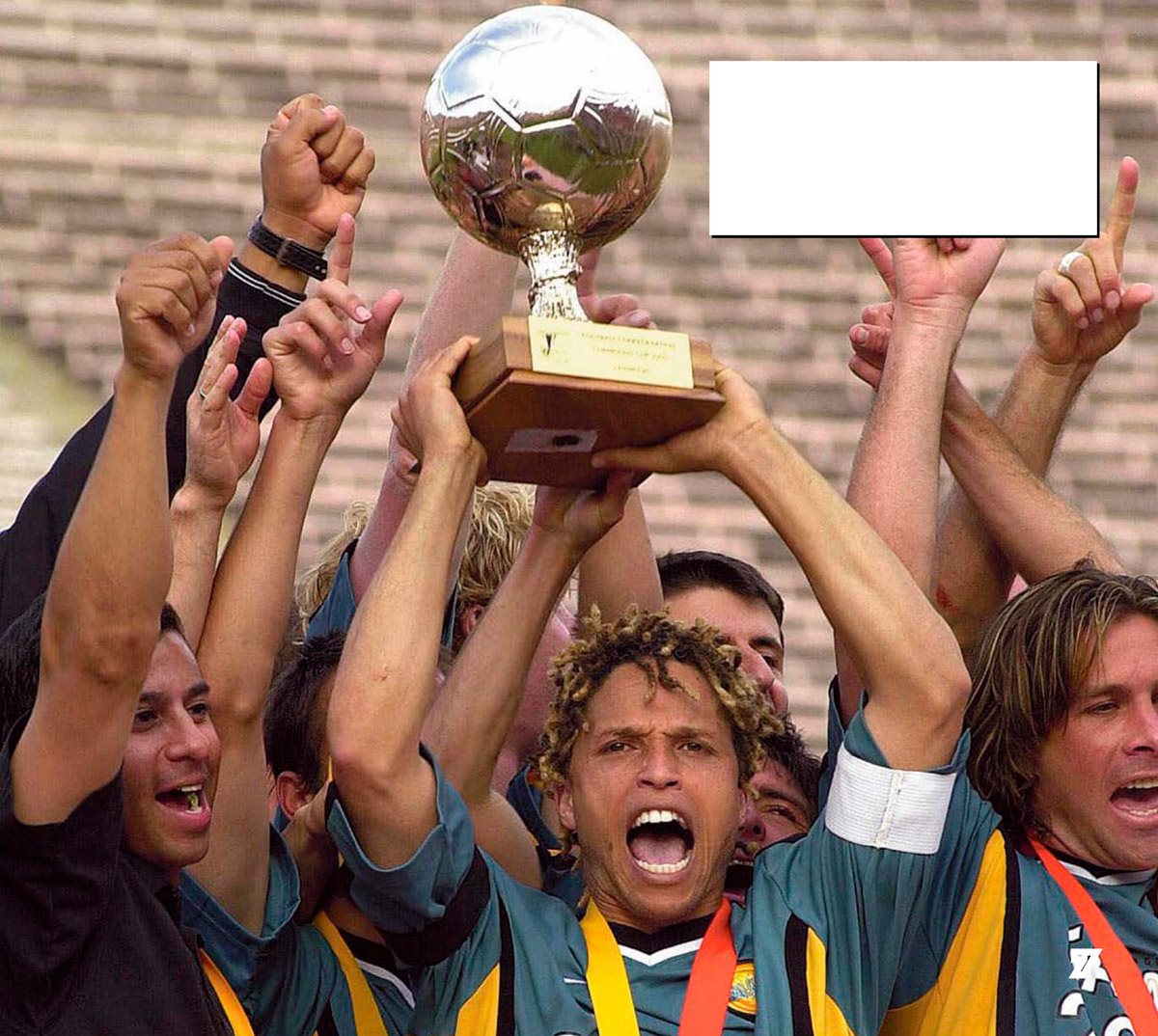 Cobi Jones leads the team cheer after the Galaxy won the CONCACAF championship - photo 9