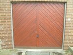 W ooden garage doors are attractive and provide excellent insulation but they - photo 1