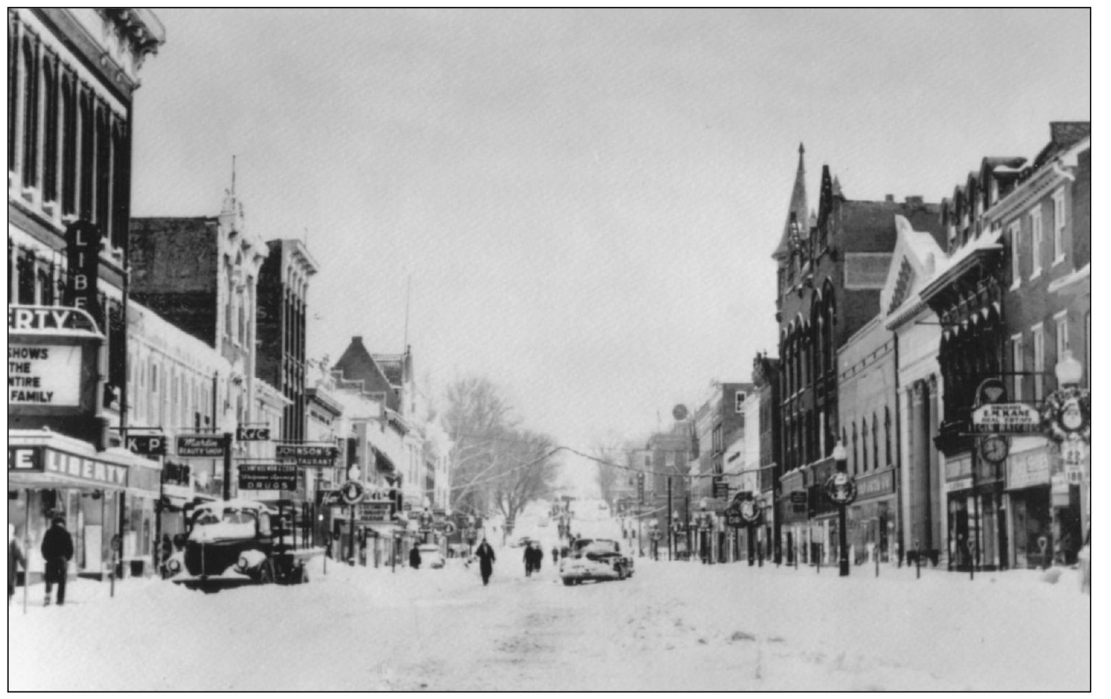 SNOW SCENE Main Street Hill is viewed before Christmas as wreaths hang from - photo 12