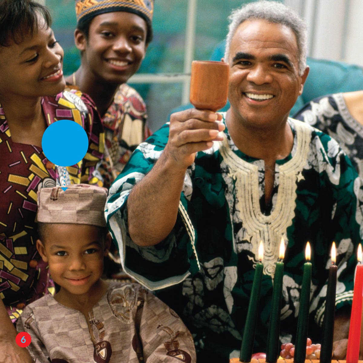 kufi It is Kwanzaa Marc wears a kufi His family lights candles - photo 6