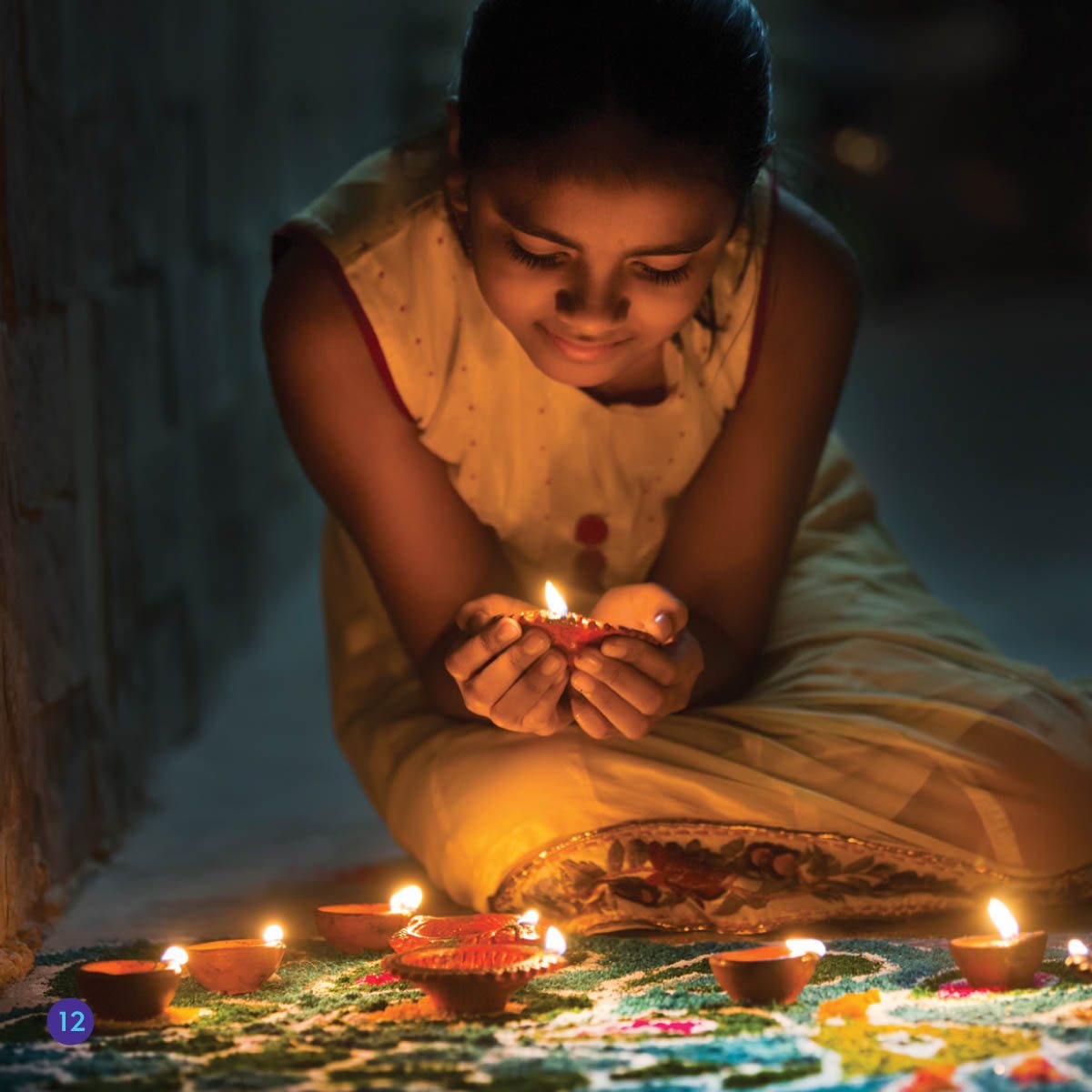 It is Diwali Nita decorates She uses colored sand She uses lights - photo 12