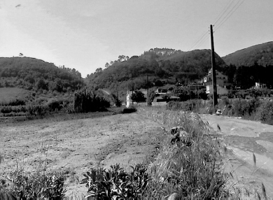 The main road out of Columbeira left of the houses and the gully to the - photo 5