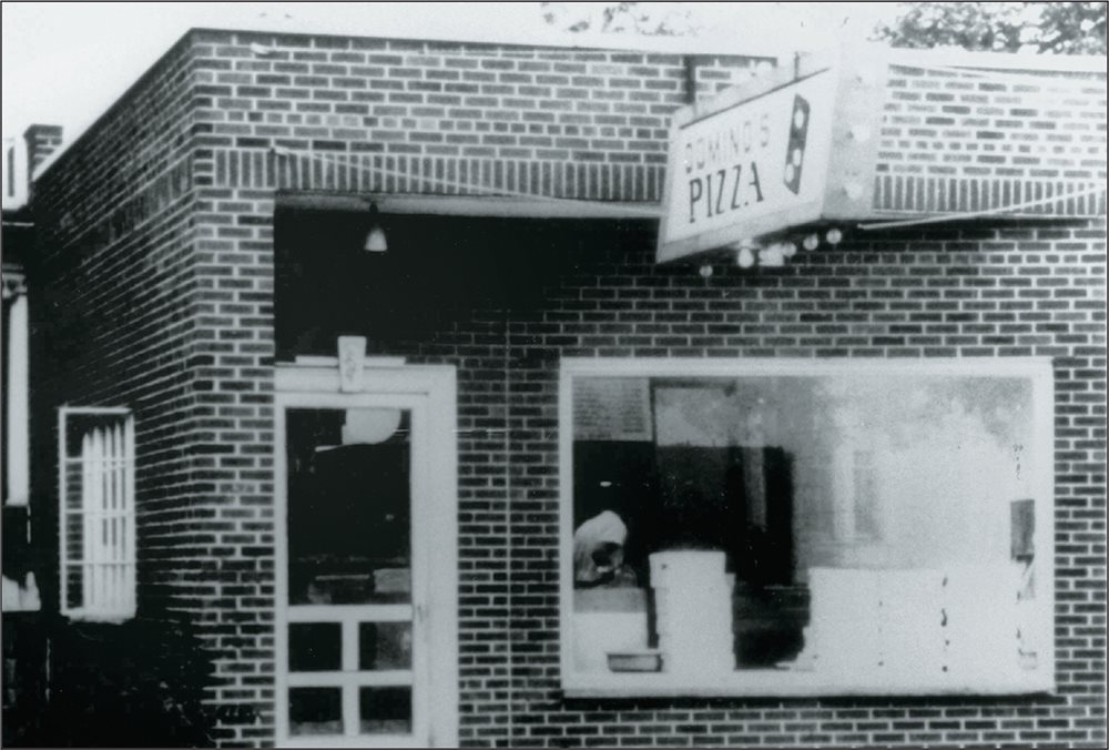 The first Dominos location was at 507 West Cross Street in a building 13 feet - photo 7