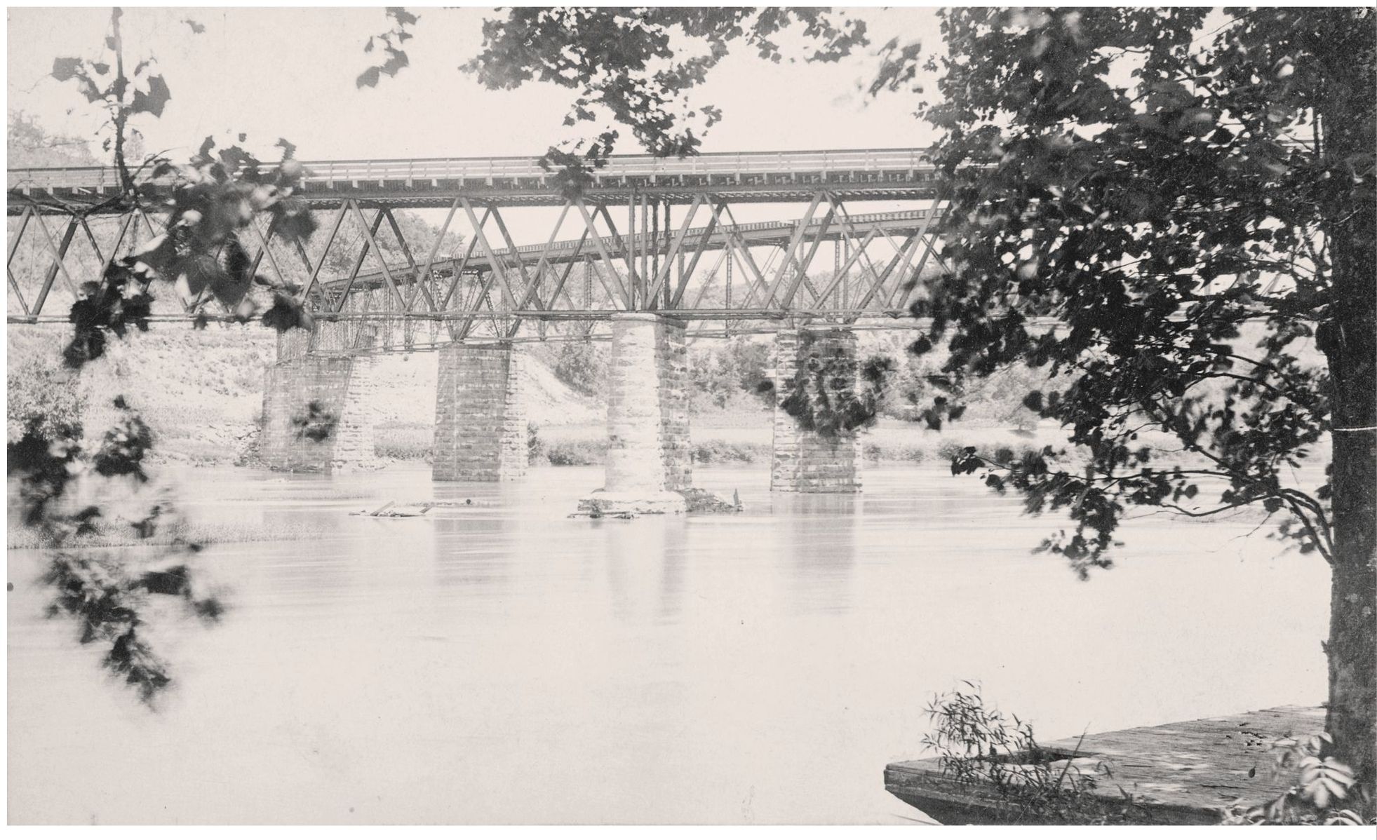 The rail line can be seen running alongside the river at the far east end of - photo 11