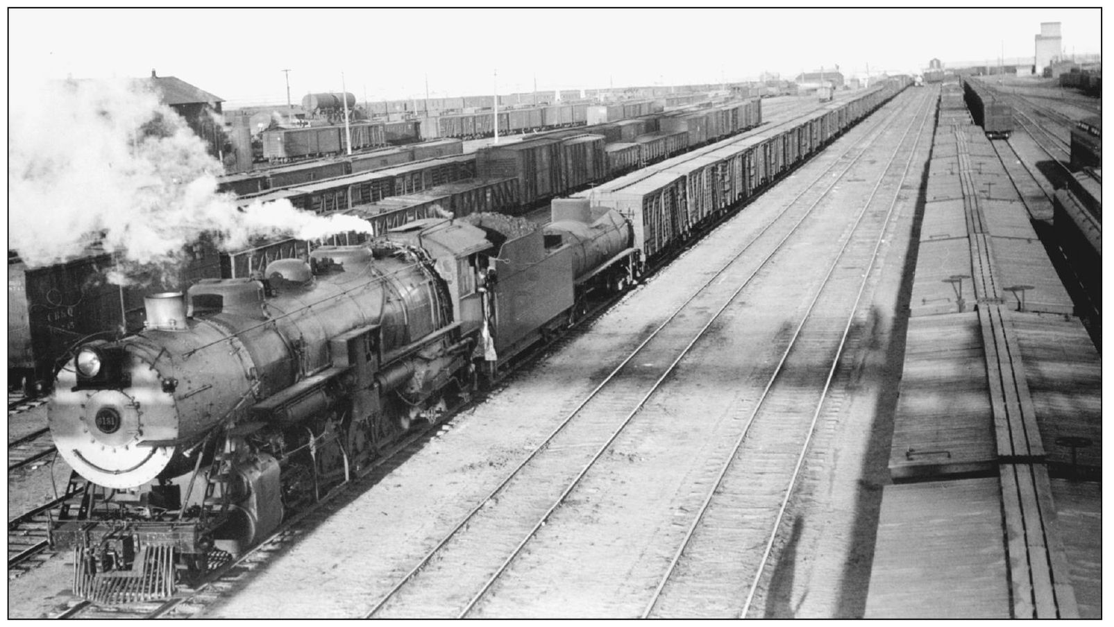 This is the Chicago Burlington and Quincy engine No 6151 in a rail yard - photo 7